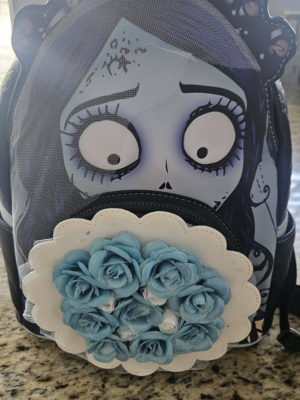 Loungefly Black and Light Blue Themed Mini Backpack with Floral Appliqué